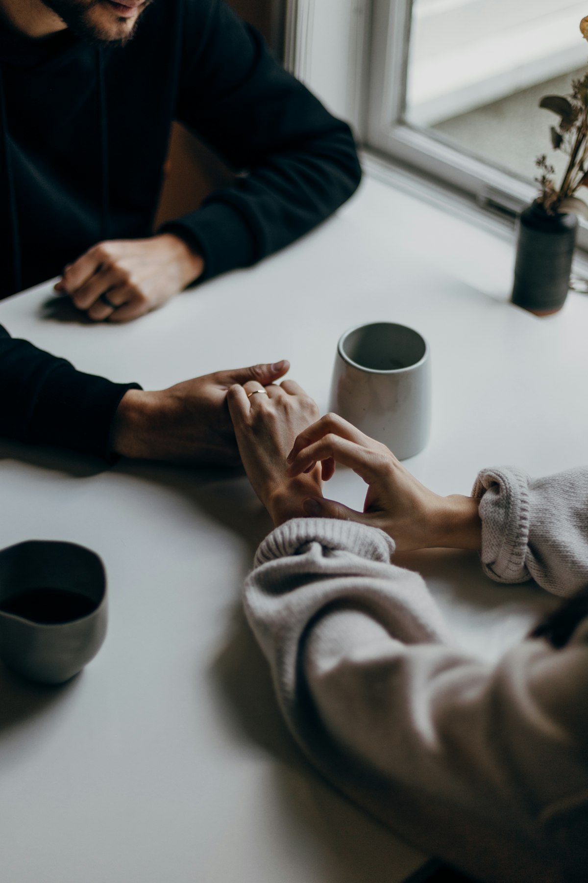 Couple having a calm conversation over coffee
